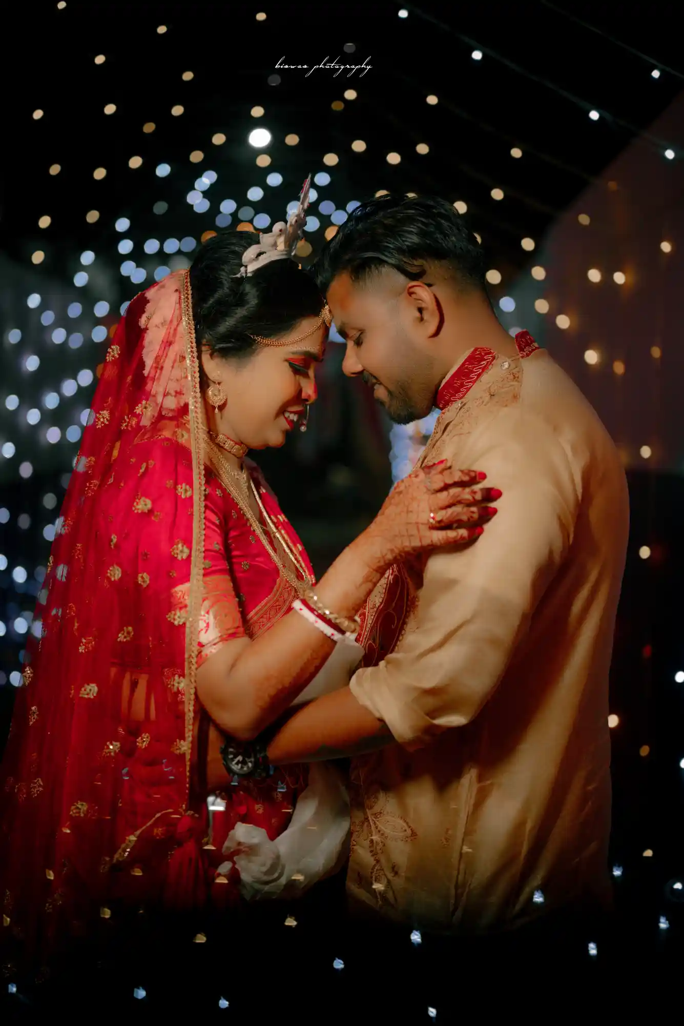 Bengali wedding ceremony by Biswas Photography in Kolkata featuring the bride and groom during traditional rituals