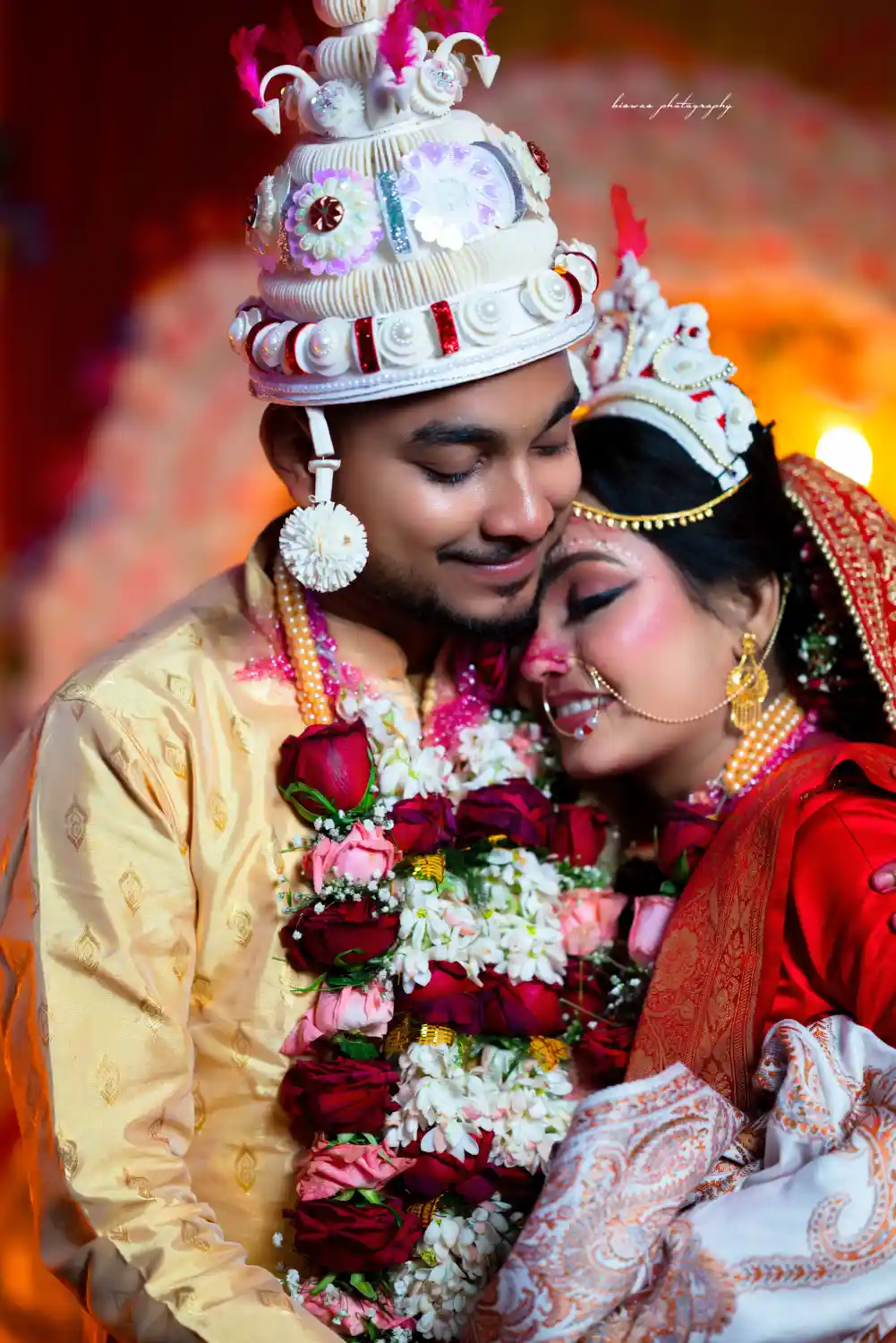 Wedding Photography in Kolkata by Biswas Photography featuring a candid moment of the bride and groom. Professional wedding photographers in Kolkata.