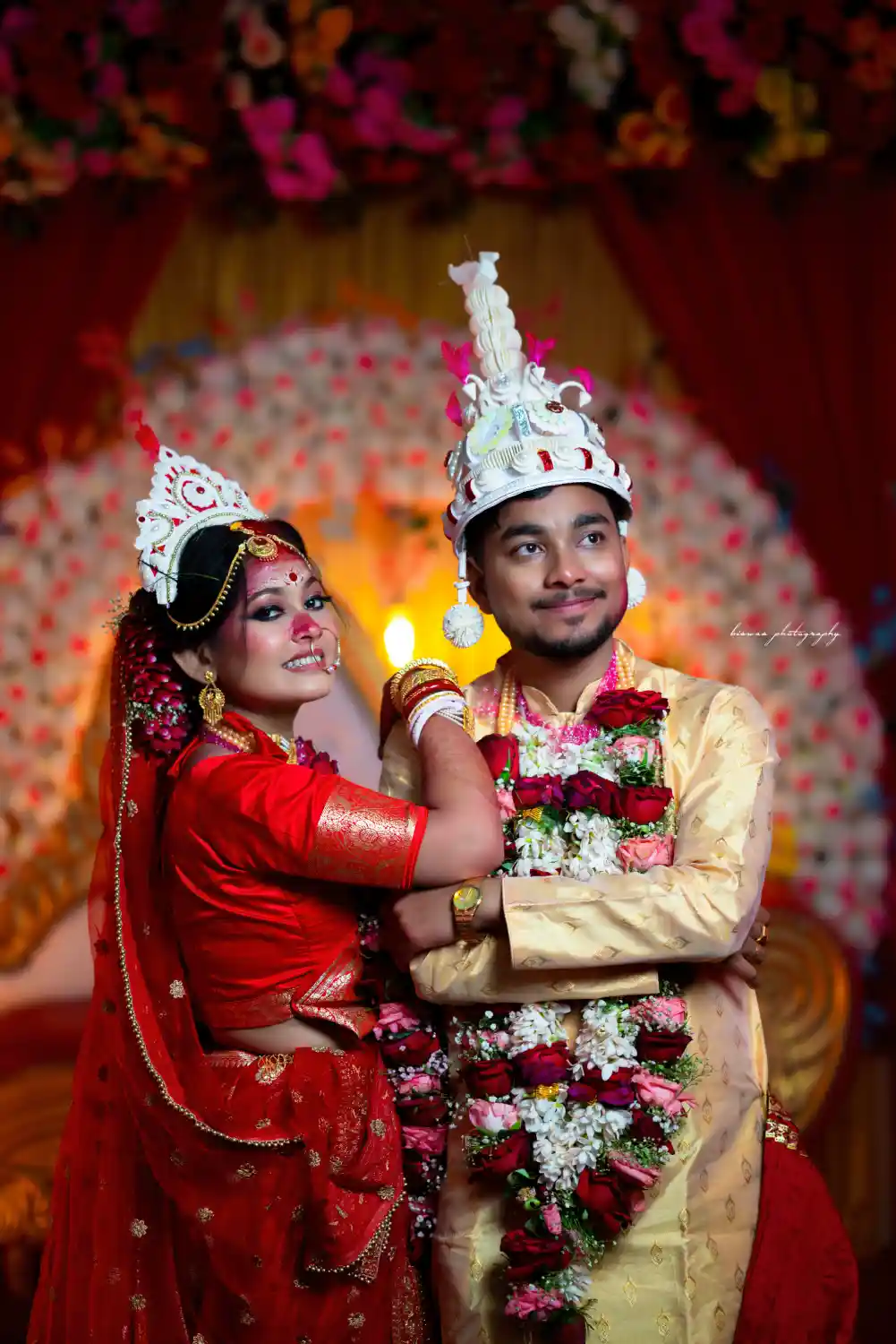 Candid wedding moment captured by Biswas Photography, a leading wedding photographer in Kolkata. Authentic Bengali wedding photography.